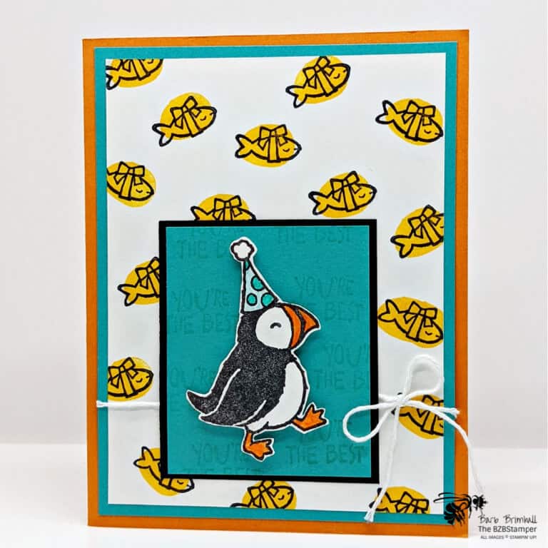 Handmade birthday card featuring puffins and fish