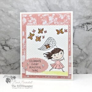 Handmade card featuring a girl catching butterflies
