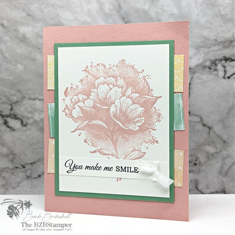 Beautiful handmade card in soft colors wiith pretty paper.