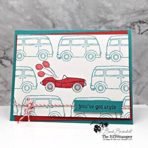 Fun handmade card featuring a bright red roadster car