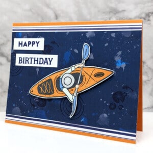 handmade happy birthday card featuring a man in a kayak