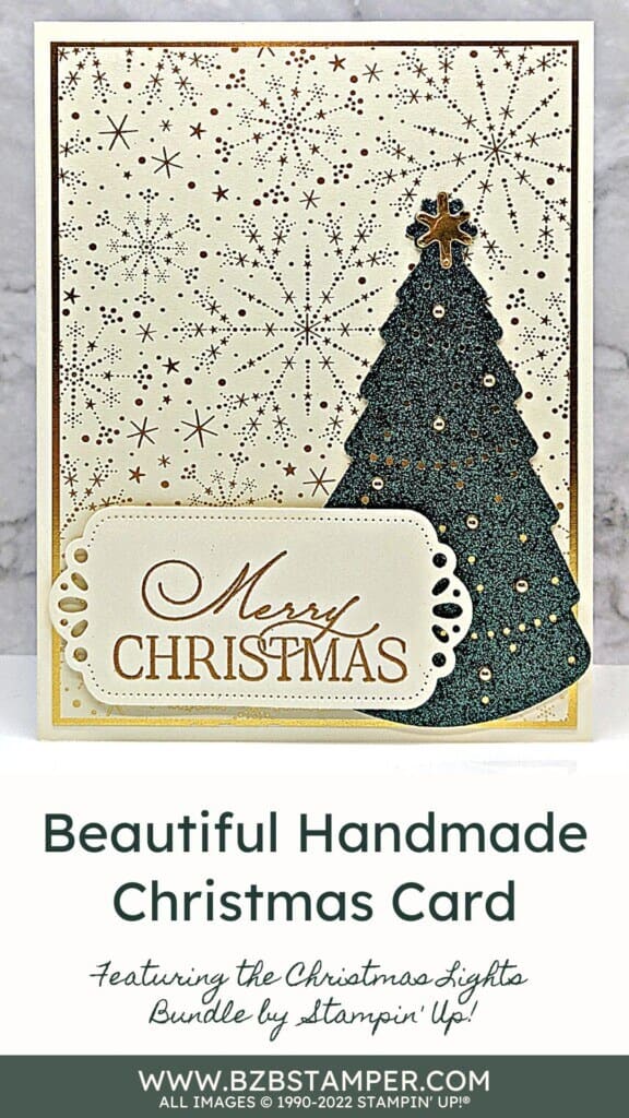 Beautiful handmade Christmas Card featuring a green glimmer tree with gold foil stars in the background