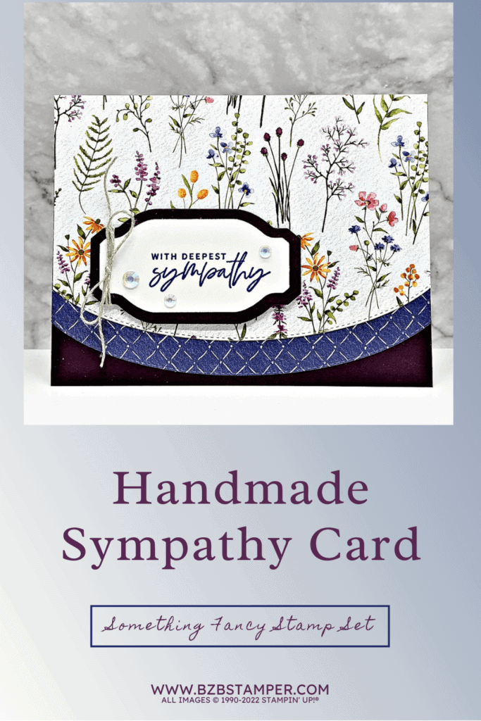Handmade Floral Sympathy card with pretty floral paper in Navy's and Purples.