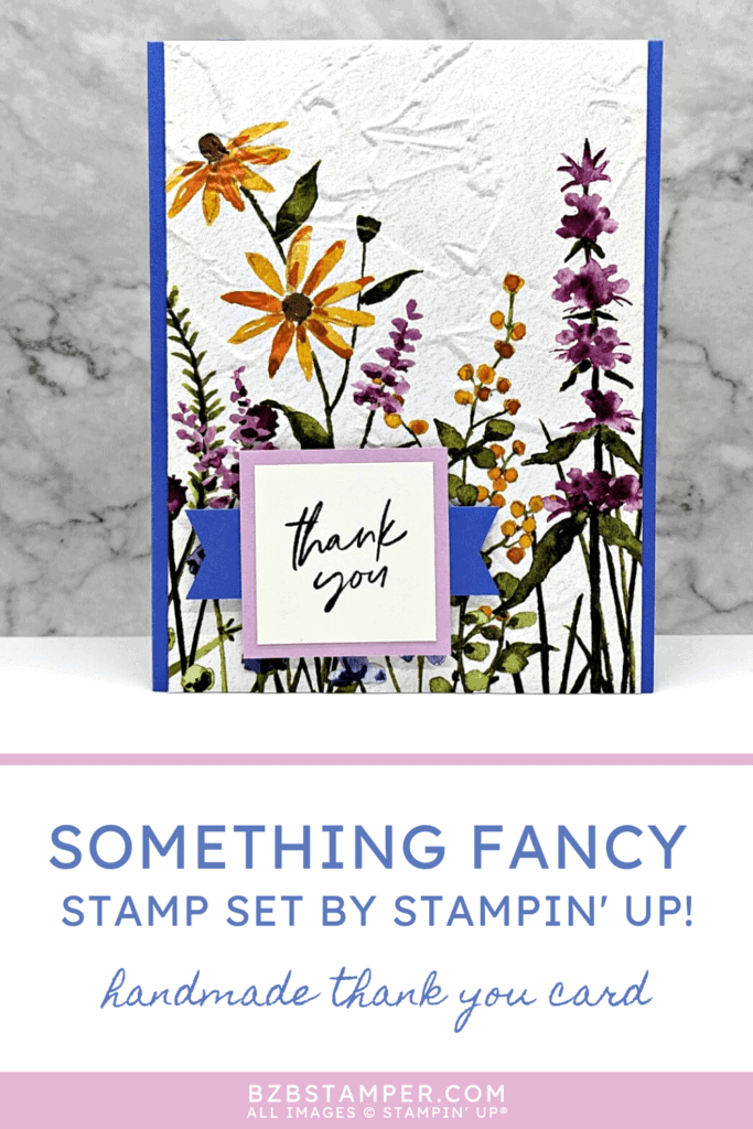 Card featuring the Dainty Flowers Pretty Paper by Stampin' Up! which is a floral pattern and has a thank you sentiment label on the front of the card.