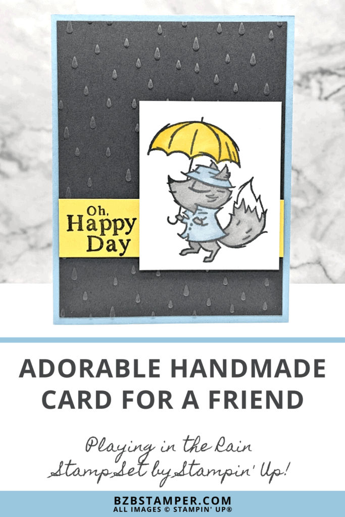 Stampin' Up! Playing in the Rain Stamp Set with a fox in a blue raincoat holding a yellow umbrella.