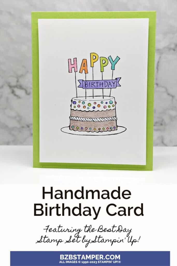 Colorful handmade birthday card with a cake and candles that spell "happy" in various colors