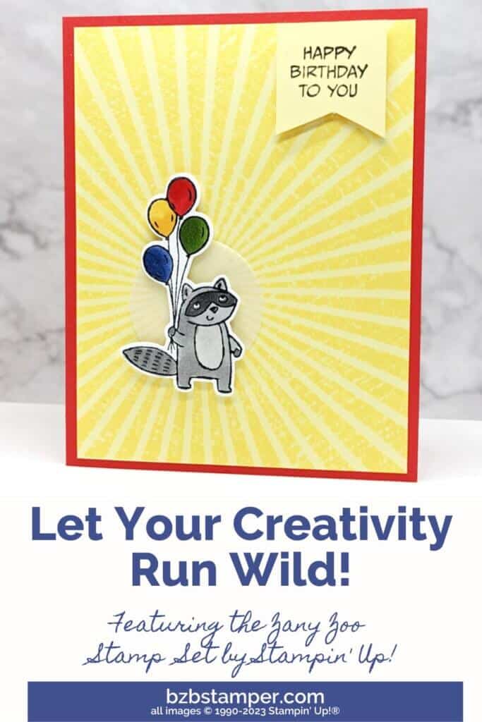 Zany Zoo Bundle: Wild Creativity handmade card in primary colors with a racoon holding balloons on a starburst.