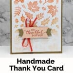 Unique Thank You Card Using the Abundant Beauty Decorative Masks using leaves and orange ink and a pretty coral ribbon.