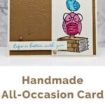 Birds Eye View All-Occasion Card with 2 birds sitting on a book in brown, blue and pink. Sentiment is life is better with you.