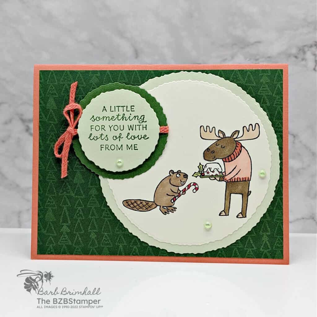 Festive and Fun Stamp Set by Stampin Up featuring a moose and a beaver exchanging gifts.  Sentiment is "a little something for you with lots of love from me"
