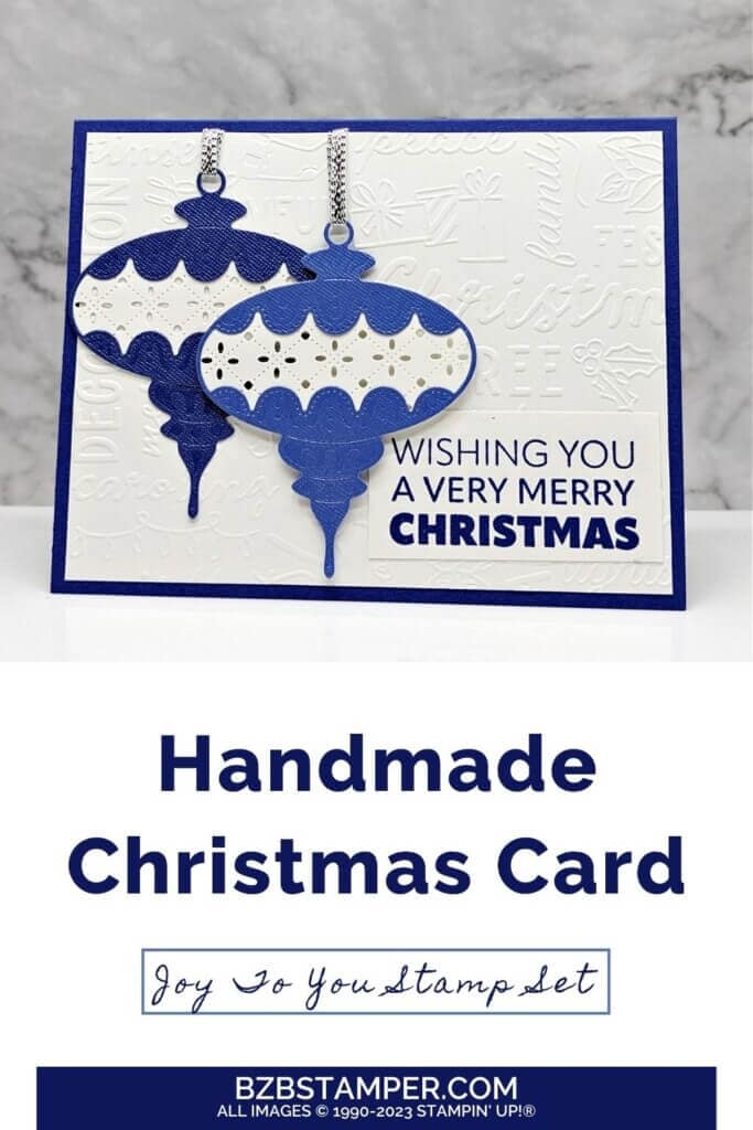 Good Tidings with the Joy To You Stamp Set by Stampin' Up! featuring 2 ornaments in different shades of blue with a Wishing You A Very Merry Christmas sentiment in blue.