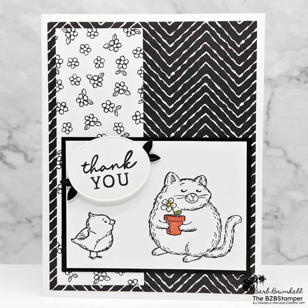 Black & White thank you card with the Fluffiest Friends Stamp Set by Stampin' Up! Features black & white paper, with a kitty and bird, with a pop of color in the flower post with a single flower.