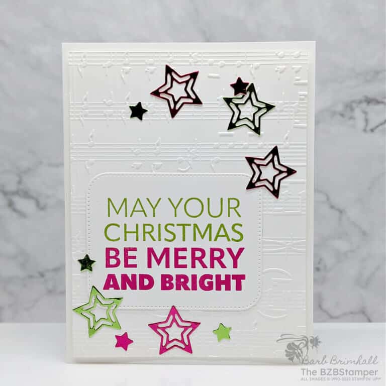 Stampin' Up! Joy To You Christmas Card featuring a May Your Christmas Be Merry & Bright sentiment in green and red with die-cut stars in the same color.