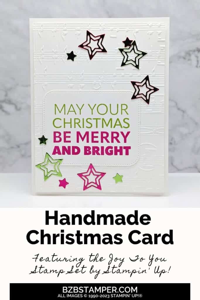 Stampin' Up! Joy To You Christmas Card featuring a May Your Christmas Be Merry & Bright sentiment in green and red with die-cut stars in the same color.