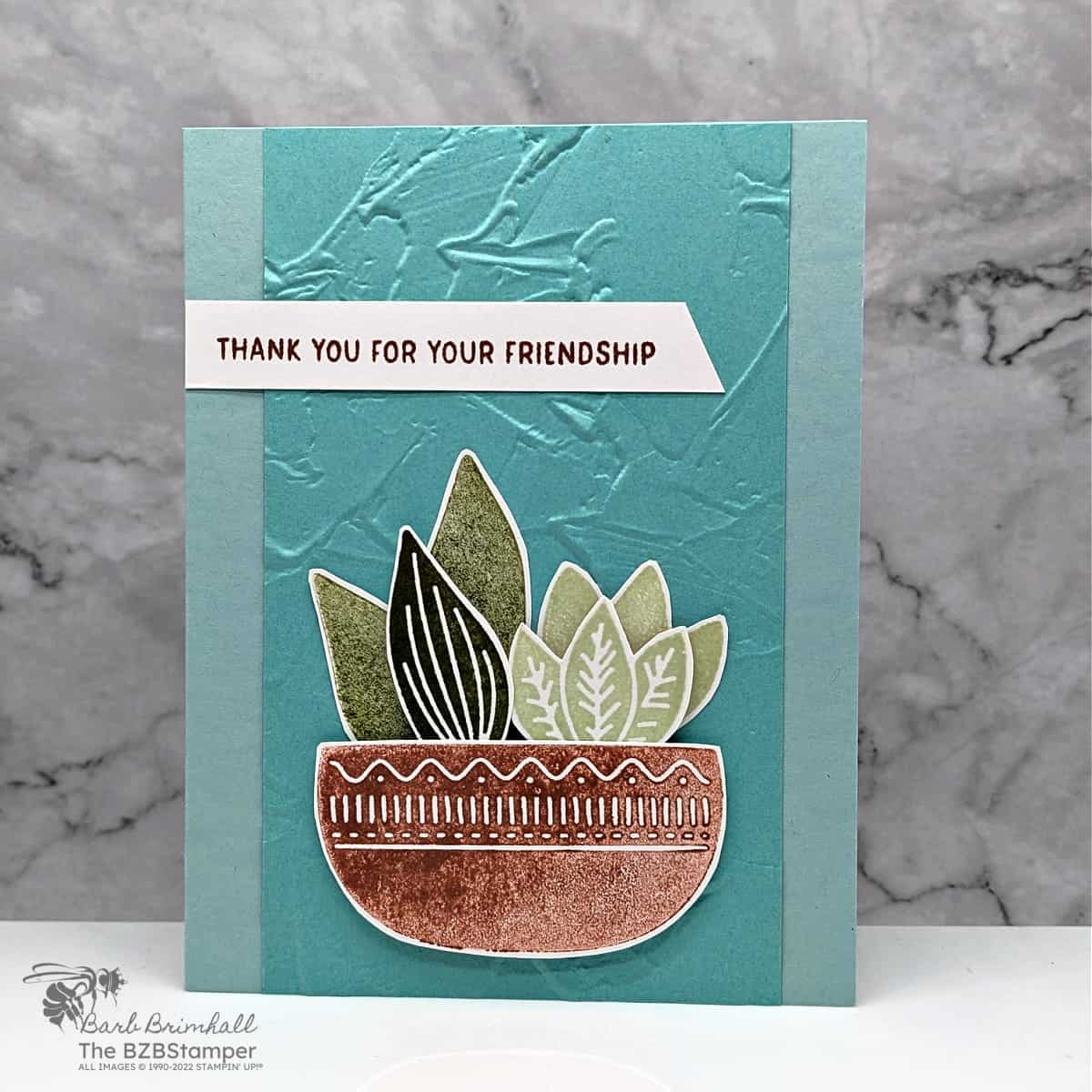 Thank You Card using the Planted Paradise Stamp Set featuring a pot with leaves in it in blues, browns and greens and a "thank you for your friendship" sentiment.