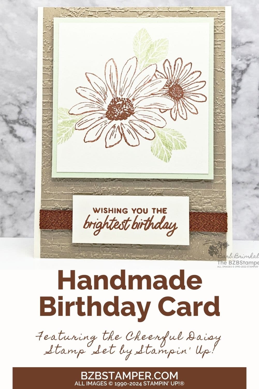 Cheerful Daisies Birthday Card in kraft and green, with an embossed background and ribbon.