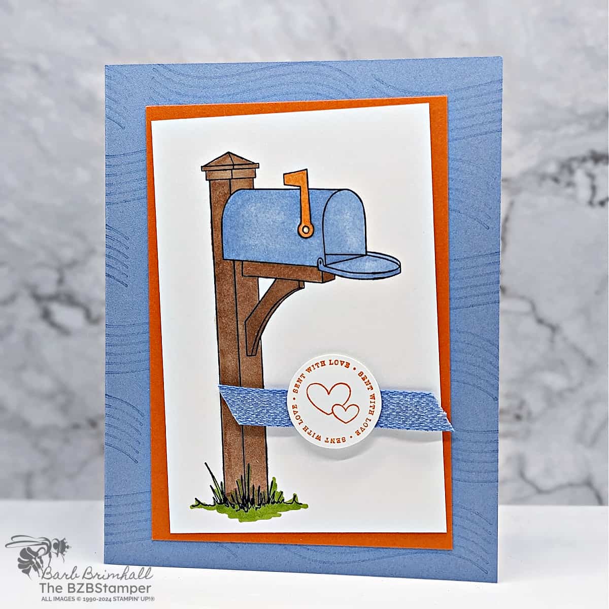 Sending Love: Quick & Easy Tutorial featuring a blue mailbox with orange highlights including a "sent with love" circle sentiment.