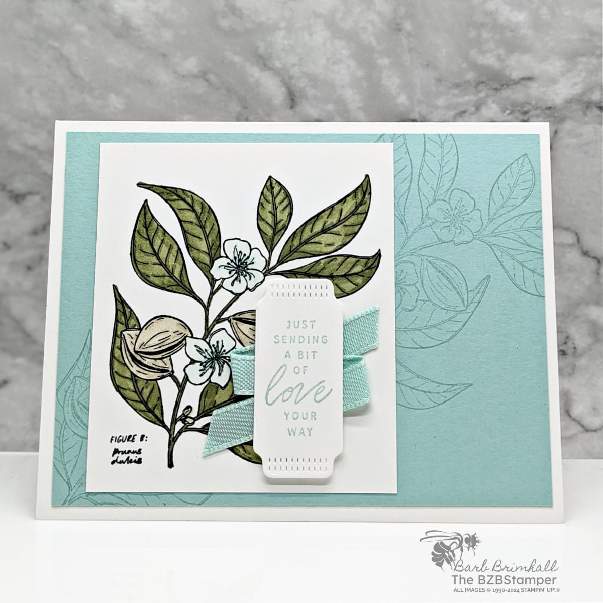 All-Occasion Card using the Lovely and Sweet Bundle in blues and greens.  Features a large flower with a "sending love" sentiment on a die-cut tag.