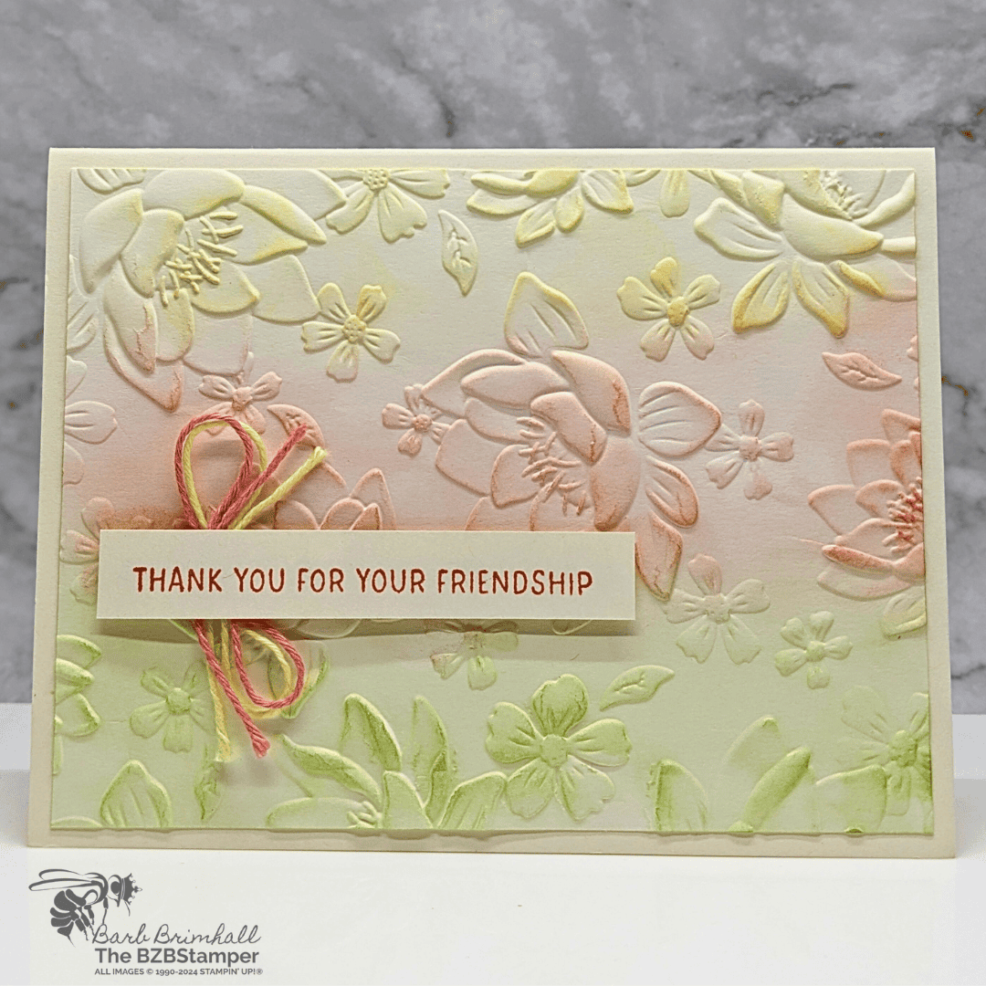 Layered Florals 3D Embossing Folder by Stampin' Up!  creates beautiful embossed flowers, highlighted in yellow, coral and green inks.
