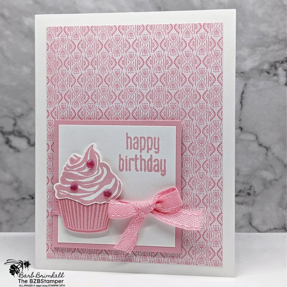 The Pocket Thoughts Birthday Card features a pink cupcake, pink embellishments, happy birthday sentiment, and pink ribbon.