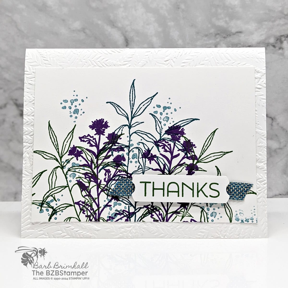 Thoughtful Wishes Thank You Card featuring flowers and leaves in dark blue and purple, with an embossed leaf background and a "thanks" sentiment.