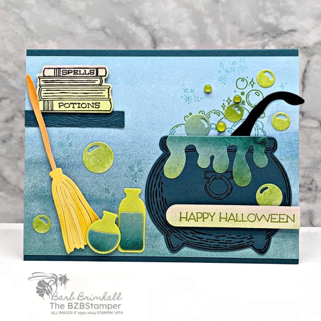 Potions and Spells Bundle featuring 3 cards in blues and greens that have a bubbling cauldron and a "happy halloween" sentiment.