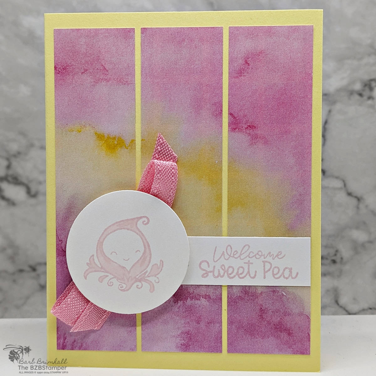 Welcome Baby Card with the Sweet Peas Stamp Set in pinks and yellow, with pretty paper and a "welcome Sweet Pea" sentiment.