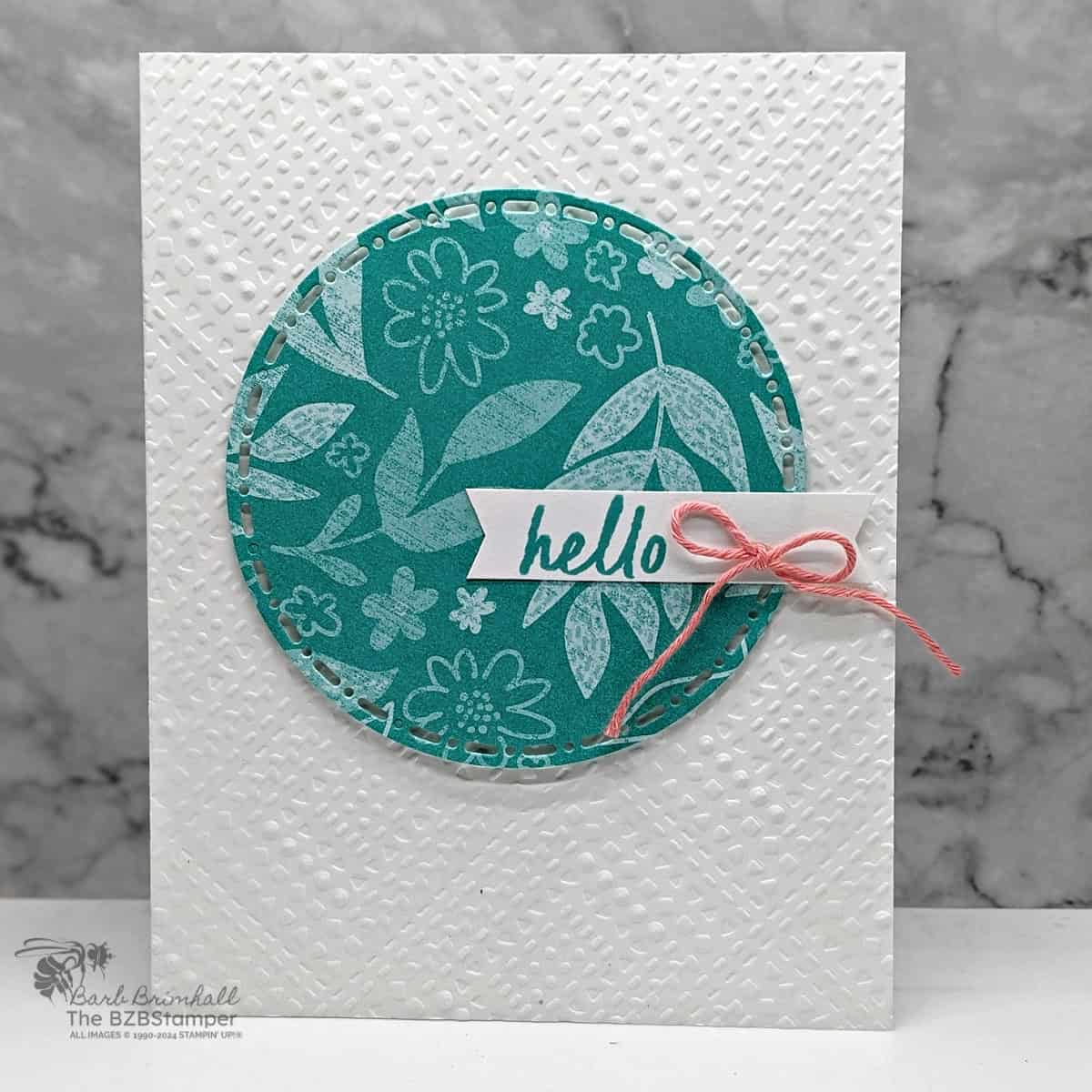 5 Minute Hello Card using Card Sketch 15 featuring white and blue elements, along with a coral bow.  The focal point is a circle with sentiment attached.