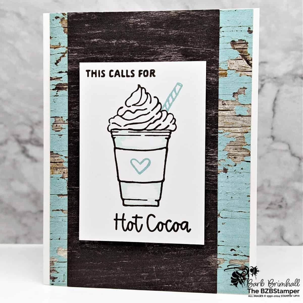 More Than Autumn Hot Cocoa Card featuring a hot cocoa drink with whipped cream and a straw in browns and blues.