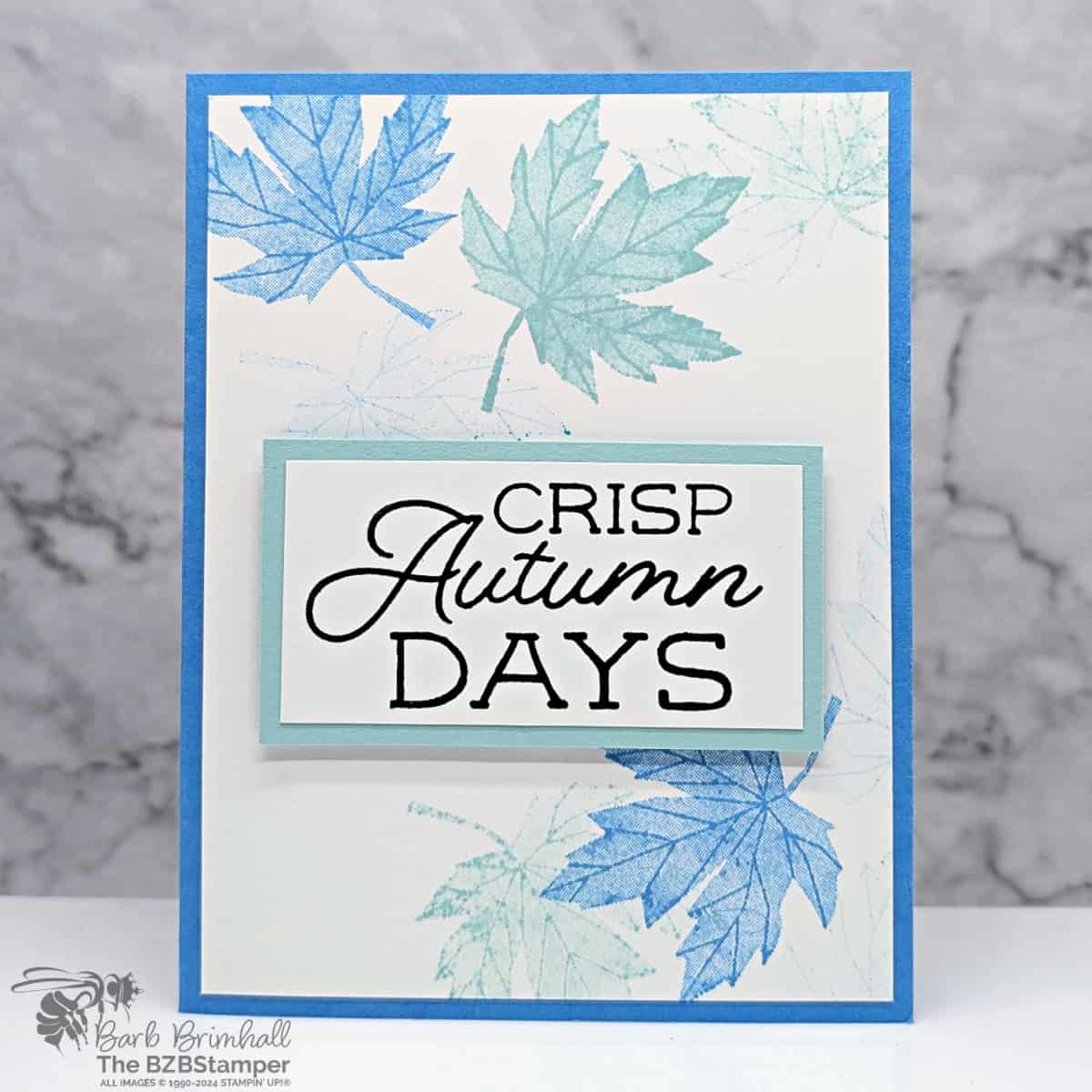 Celebrate Fall with Autumn to Remember Stamp Set using leaves in different shades of blue and a sentiment of "Crisp Autumn Days."
