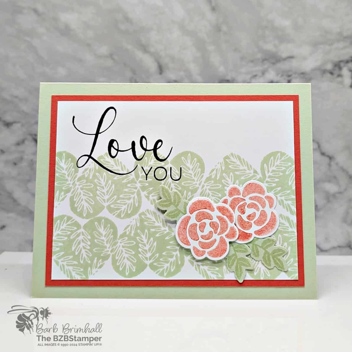 Love You Cards with the Hearts of Elegance Bundle featuring orange flowers and green hearts, with a "love you" sentiment.
