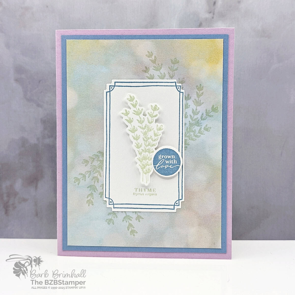 Easy Card using the Grow With Love Bundle featuring Thyme in greens and paper in blues and purples, with a circle sentment "grown with love."