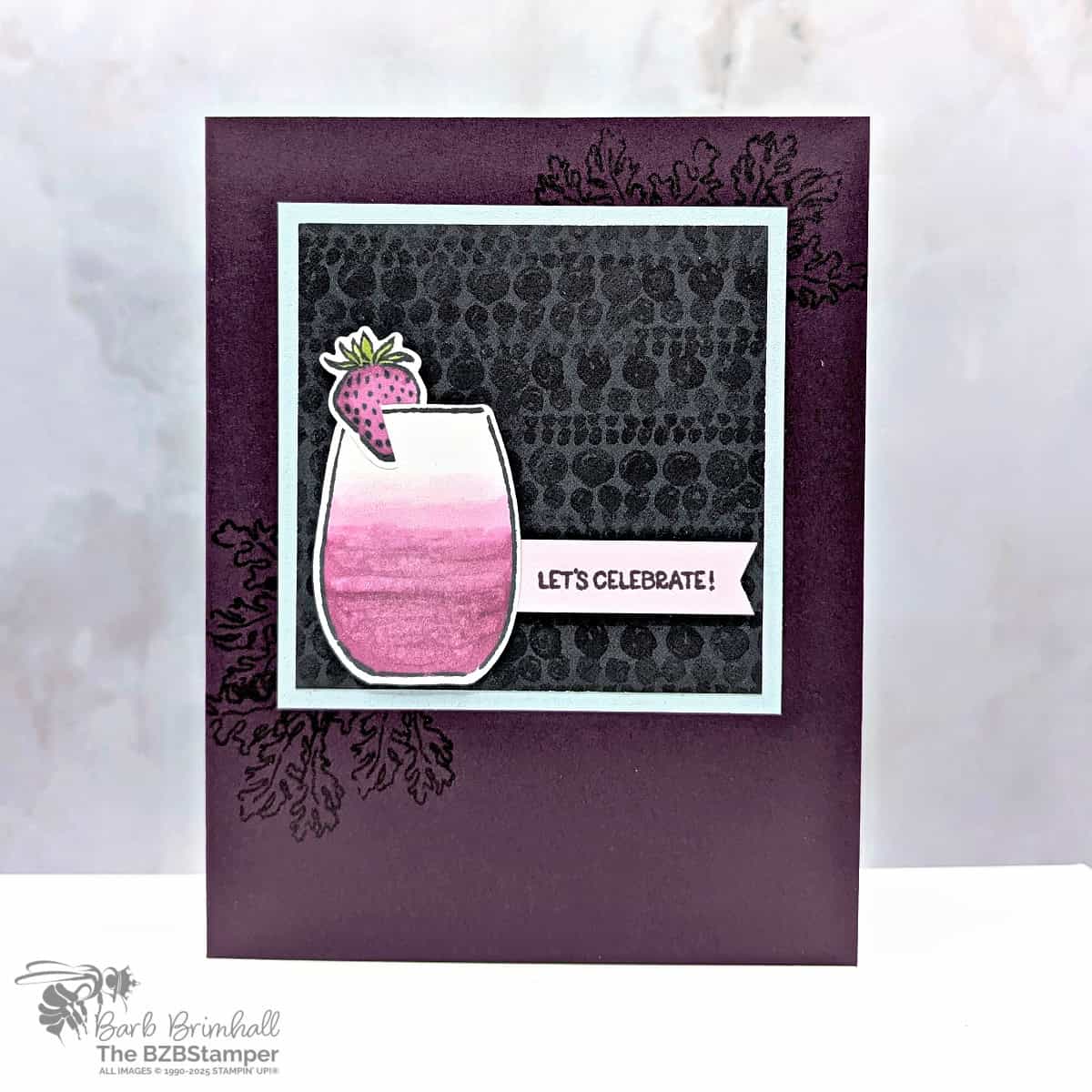 Celebrate in Style with the Cheers and Sips Bundle 1 Celebrate in Style with the Cheers and Sips Bundle in purples and black, featuring pretty paper, a glass with a strawberry on top and a "let's celebrate" sentiment