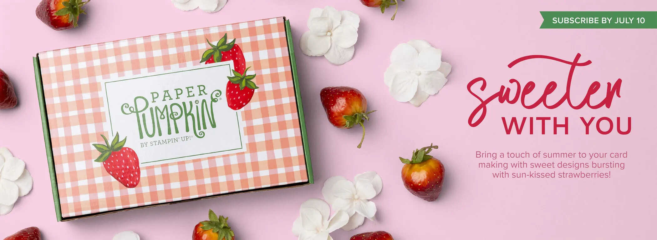 Picture of the Monthly Crafting Subscription Box, Sweeter With You  monthly crafting pink gingham box featuring strawberries and flower petal images on a pink background and a "Sweeter with you" headline in red.
