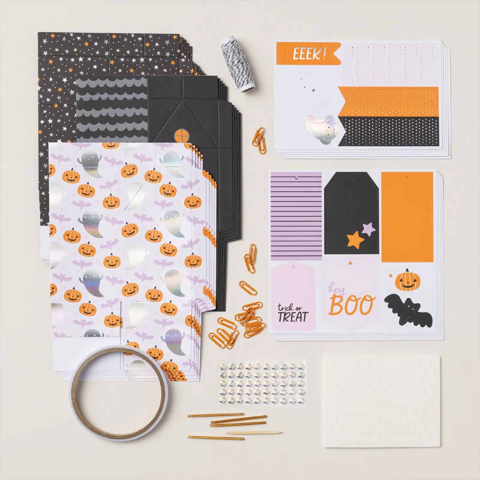 Sweet Treats Made Simple with the Sweet and Spooky Kit makes 15 treat boxes in orange, purple and black.  Picture shows what comes in the Kit