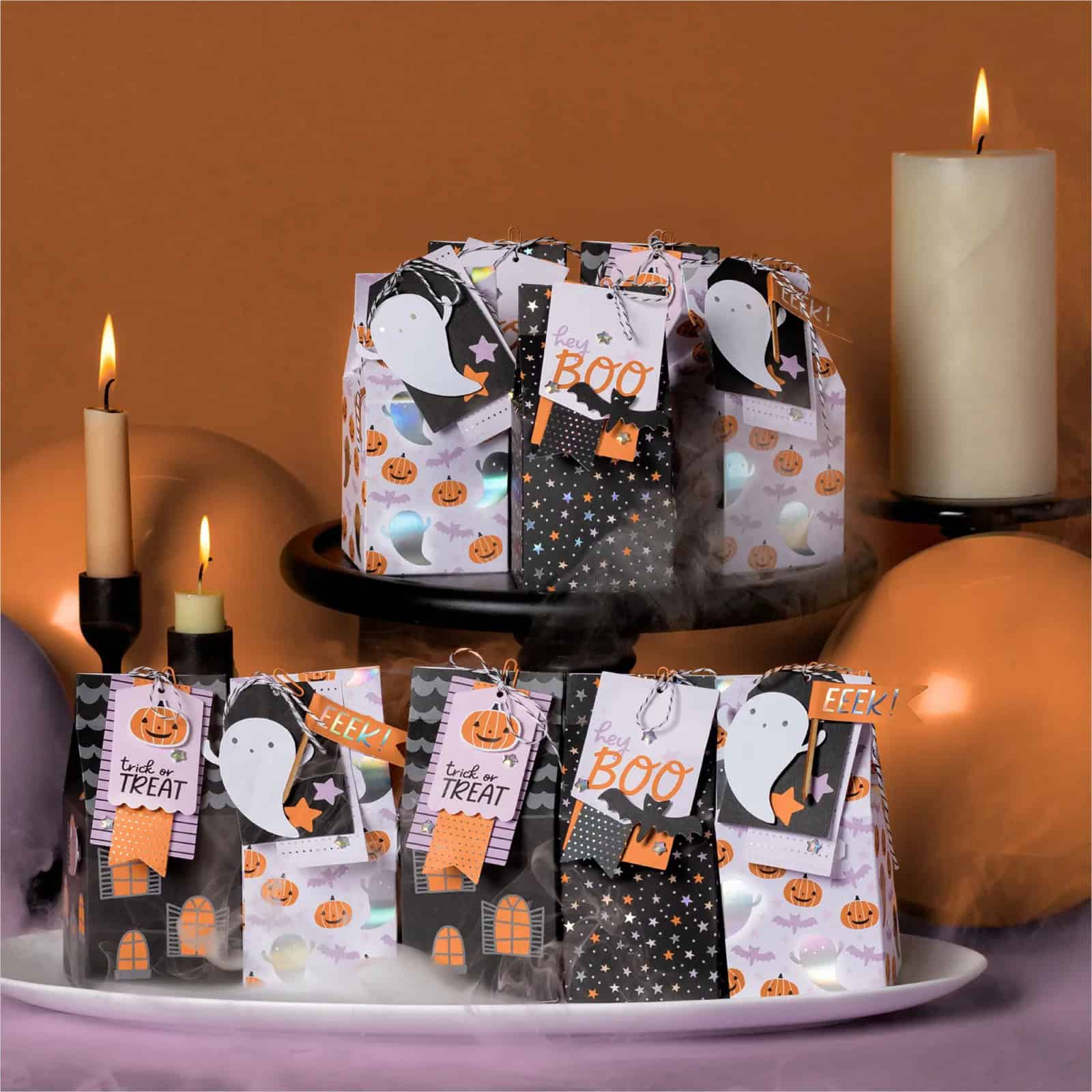 Sweet Treats Made Simple with the Sweet and Spooky Kit makes 15 treat boxes in orange, purple and black.  Picture shows the finished treat boxes.
