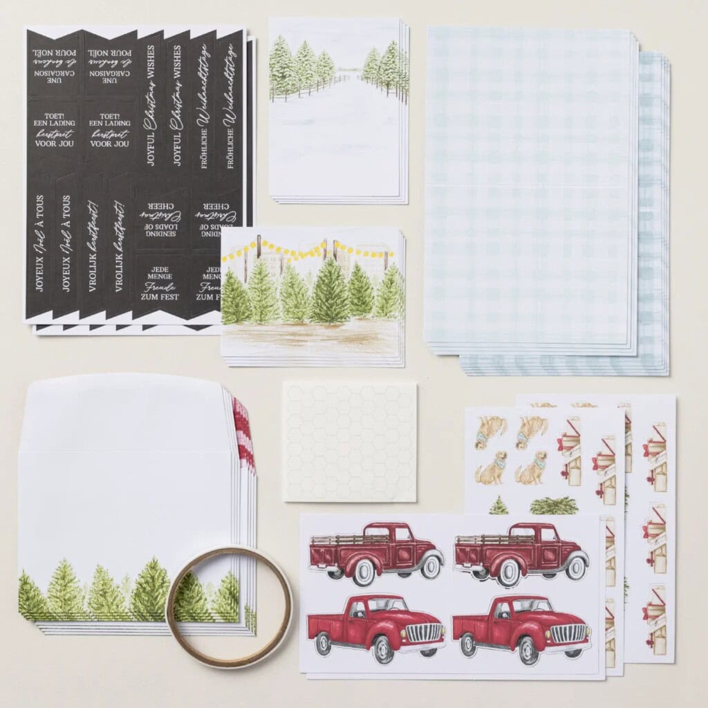 Road To Christmas Card Kit featuring handmade Christmas cards with a vintage red truck, snowy tree farm backgrounds, and festive preprinted sentiments.