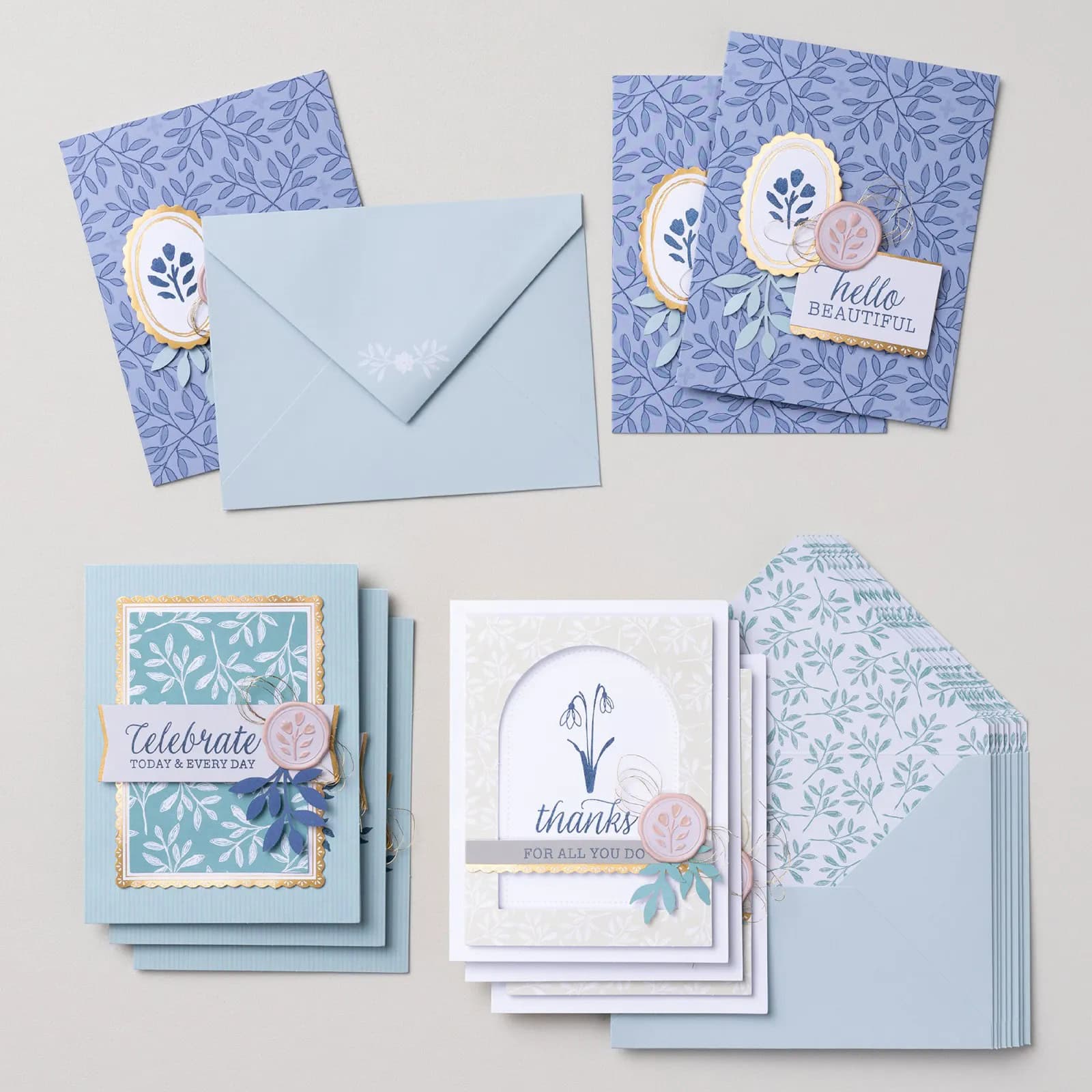 Everyday Beauty All-Inclusive Cardmaking Kit, featuring soft blue and pink botanical patterns, gold foil details, and coordinating envelopes.
