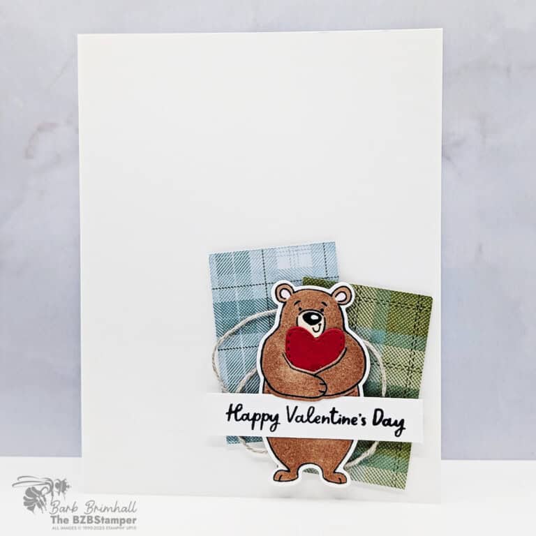 Adorable Valentine&rsquo;s Day bear stamp with heart, perfect for crafting and card making.