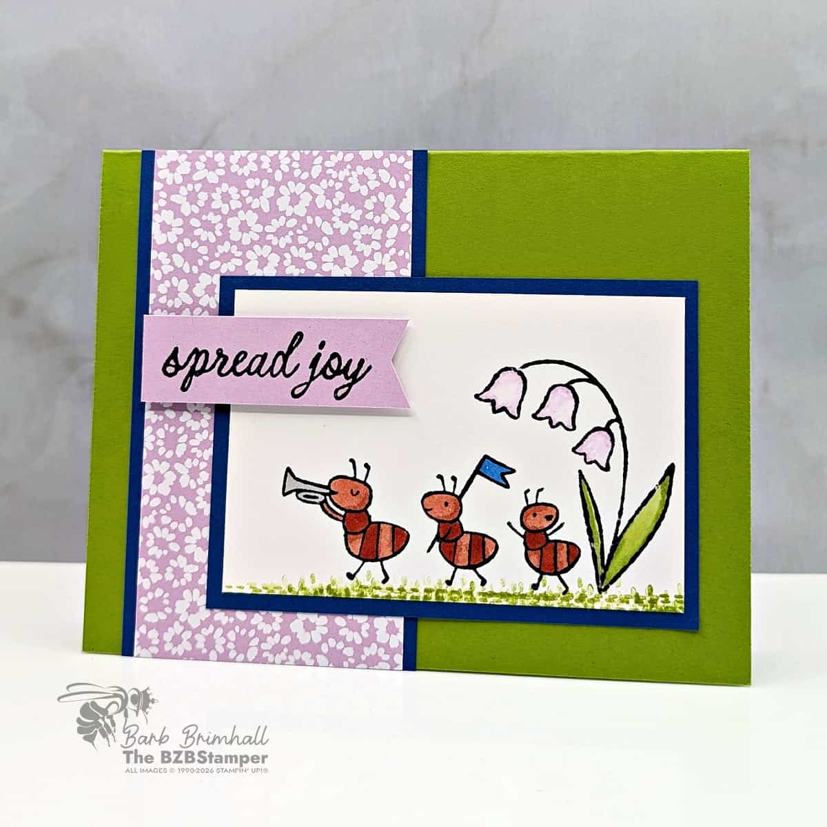 Cute handmade greeting card featuring whimsical ants and floral design with uplifting "spread joy" message.