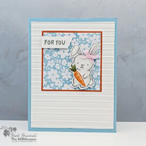 Cute bunny Easter card with carrot, pink bow, "For You" sentiment, floral background, handmade stamping design.