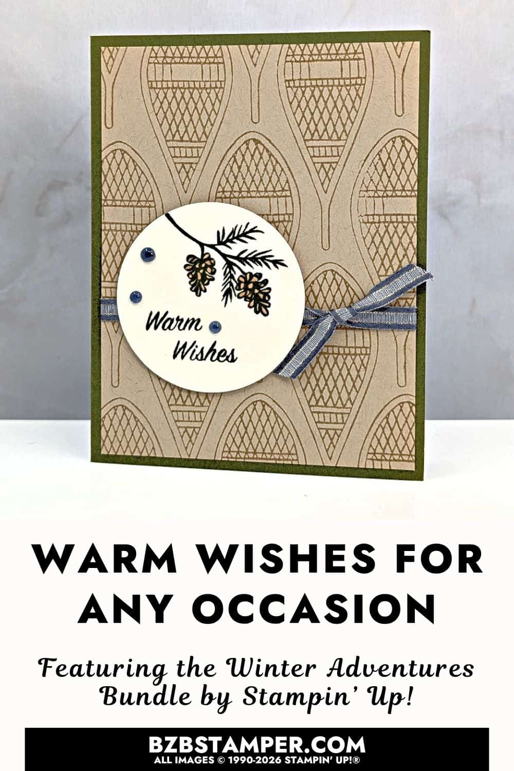 Easy winter greeting card featuring stamped pinecones, a Warm Wishes greeting, patterned Crumb Cake background, Mossy Meadow card base, and blue ribbon bow.
